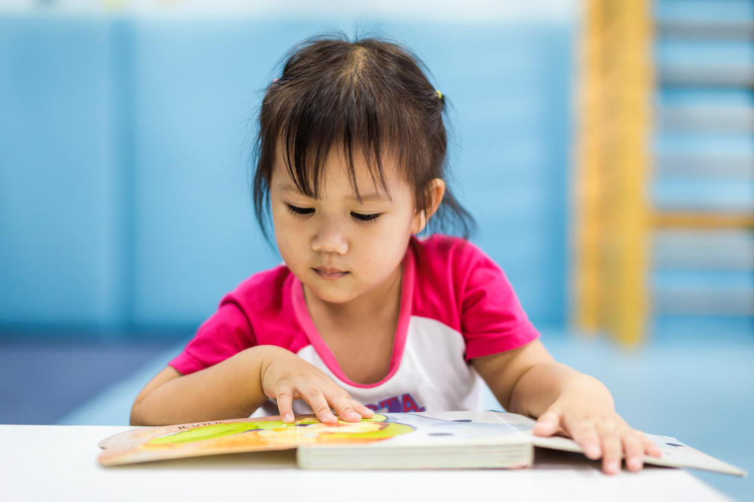 Kids reading a book